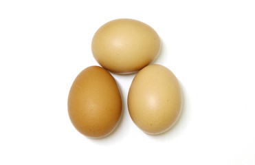 three eggs isolated on white background