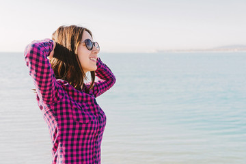 Young woman enjoying a nice day in summer