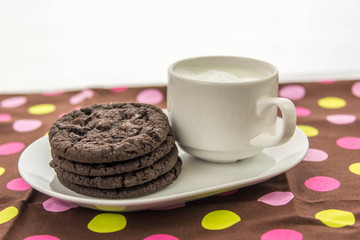 chocolate cookies and glass of milk