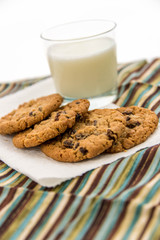 oatmeal raisin cookies and glass of milk
