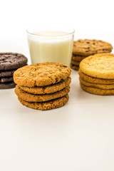 Fototapeta na wymiar variety of cookies and glass of milk