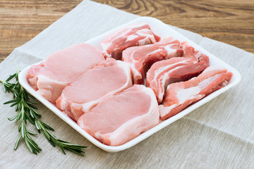 Raw pork meat on wooden desk