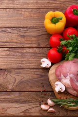 Raw pork meat on wooden desk