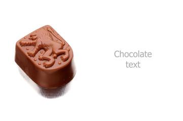 chocolate candy on white background with place for text