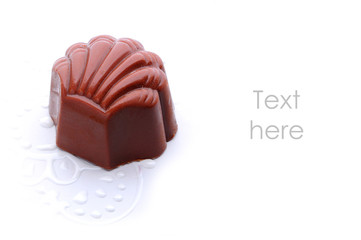 chocolate candy on white background with place for text