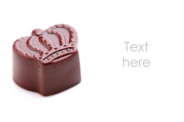 chocolate candy on white background with place for text