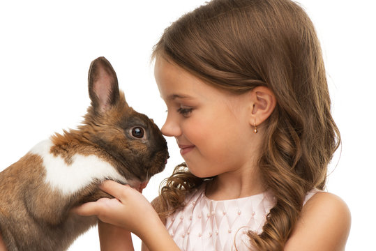 Little girl is toe with cute bunny