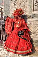 Fototapeta na wymiar Woman in red - Carnevale Venezia