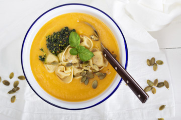 Pumpkin cream soup with cheese tortellini