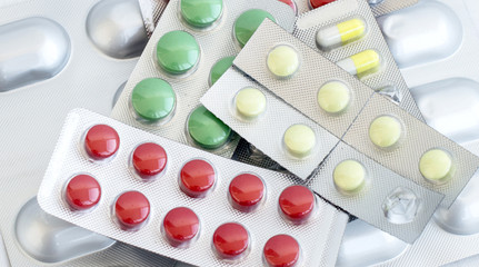 A variety of different colored pills for the treatment