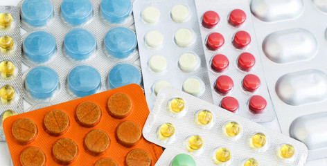 A variety of different colored pills