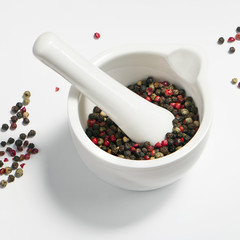 Peppercorns in a mortar