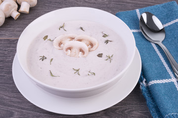 Fresh mushroom soup in a white bowl