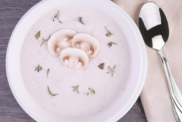 Fresh mushroom soup in a white bowl