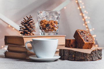 composition books, bump, chocolate cake and cup of coffee