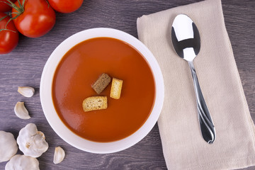 Fresh tomato soup in a white bowl
