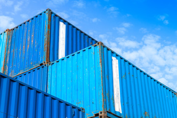 Fototapeta na wymiar Blue metal Industrial cargo containers are stacked