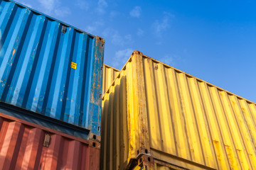 Colorful cargo containers are stacked in the storage area