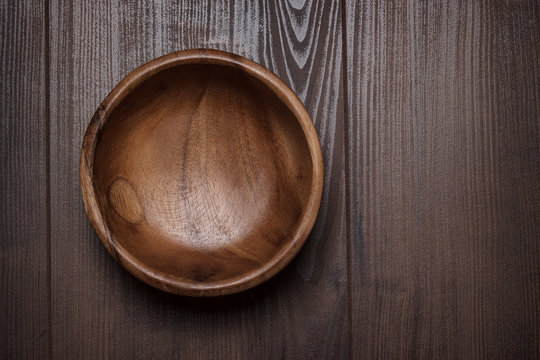 salad bowl on the  brown wooden table
