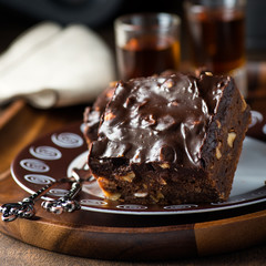 Homemade chocolate brownies with nuts and ganache