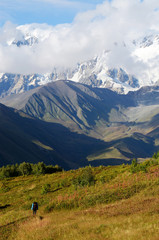 Fototapeta na wymiar Mountaineer following famous trekking route,Caucasus mountains