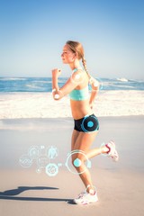 Composite image of fit blonde jogging on the beach