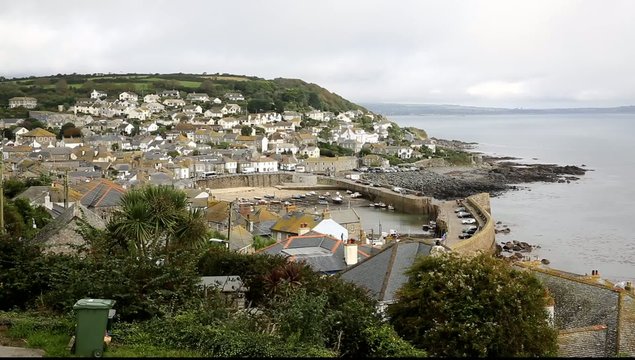 Mousehole harbour and fishing village Cornwall England UK