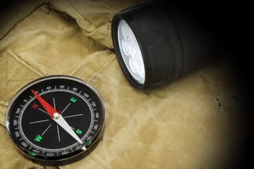 Searchlight and Compass on Backpack