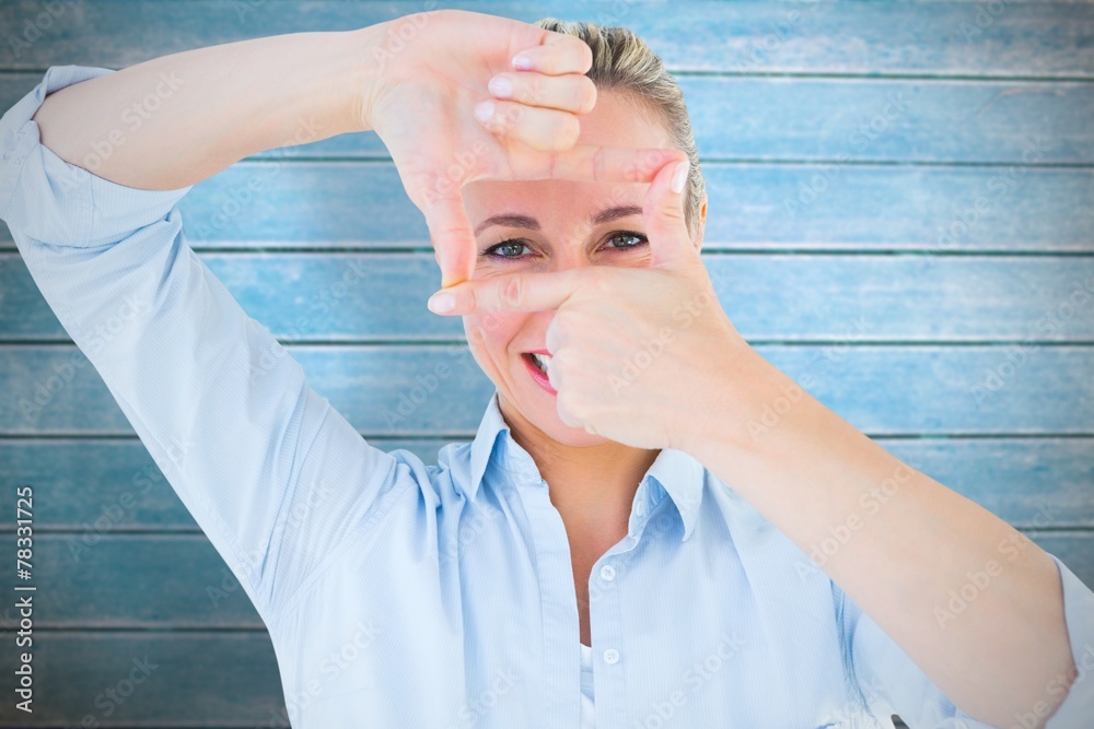 Poster composite image of smiling blonde making a hand gesture