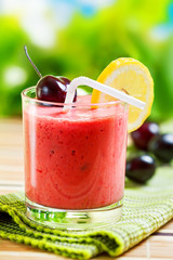 Summer drink, strawberry smoothie, outdoor