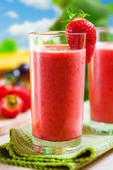 Summer drink, strawberry smoothies, outdoor