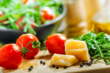 Food, tomato rucola and Parmesan salad