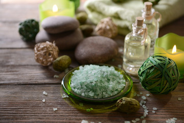 Composition of spa treatment on wooden background