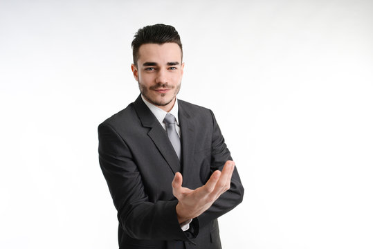 isolated young business man positive attitude with his hands
