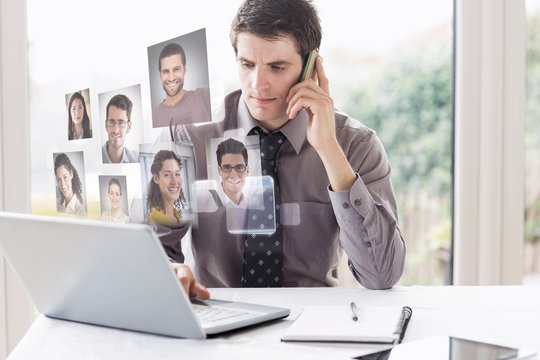 Composite image of business man on phone and laptop