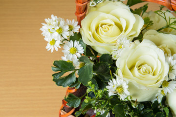 White roses in a basket