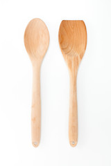 Wooden ladle and spatula on white background, kitchen utensils