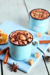 Mugs of hot coffee with marshmallow