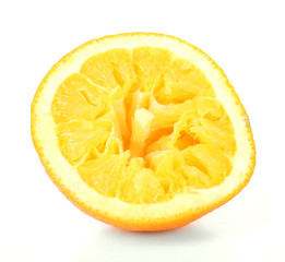 Squeezed orange isolated on white