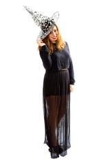 Fototapeta premium pretty young happy woman smiling with witch hat