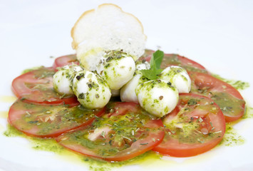 appetizer with tomatoes and cheese in a restaurant