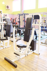 Fototapeta na wymiar Fitness gym with sports equipment