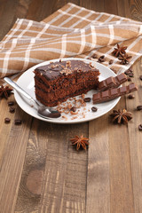 chocolate cake  in a bowl on a wooden boards background