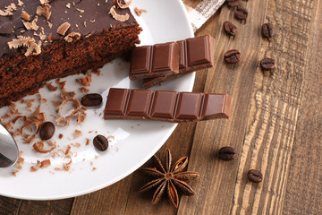 chocolate cake  in a bowl on a wooden boards background