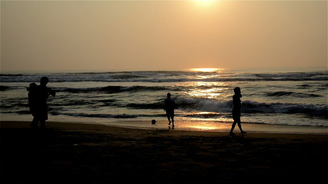 The local people play a ball at the beach, Da Nang, Vietnam
