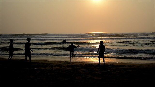 The local people play a ball at the beach, Da Nang, Vietnam
