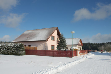 new modern house in village in winter