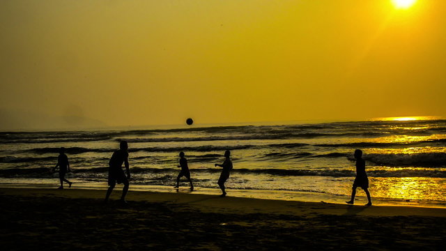 The local people play a ball at the beach, Da Nang, Vietnam
