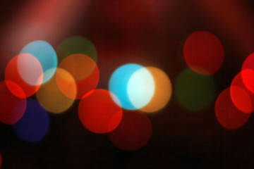 Abstract circular bokeh background on dark night