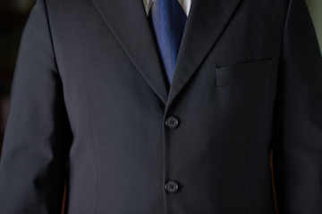 Fragment of a man in a business suit